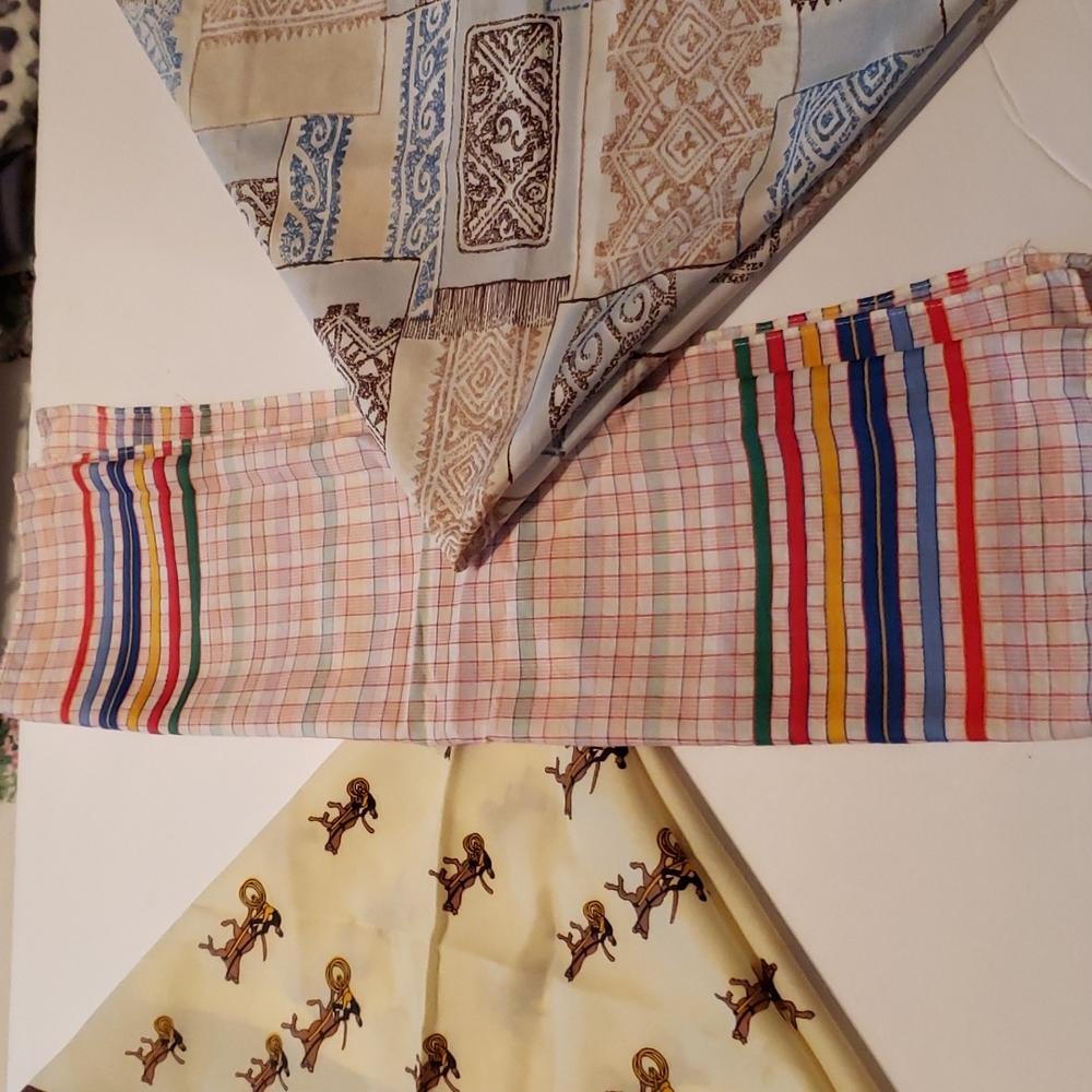 3 Scarfs- different designs and different colors.
